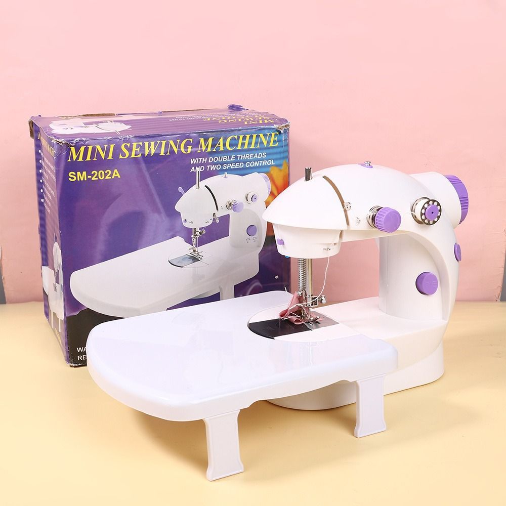 maquina de cocer con mesa portatil  .... venta por unidad: imagen 1
